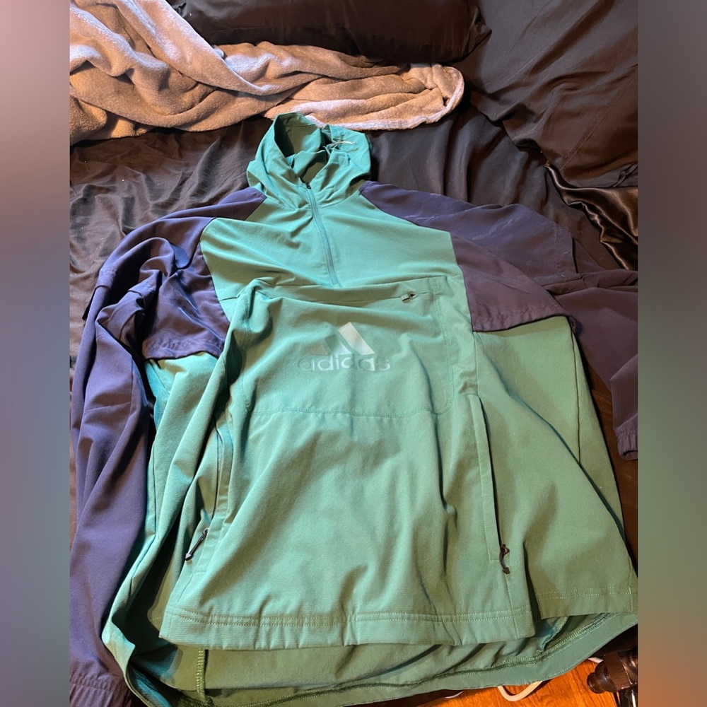 size large blue and green adidas wind breaker
